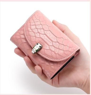 China Hot Sale Fashion Snake RFID Embossed Money Bag Shorts Walle Card Holder Wallets For Women for sale