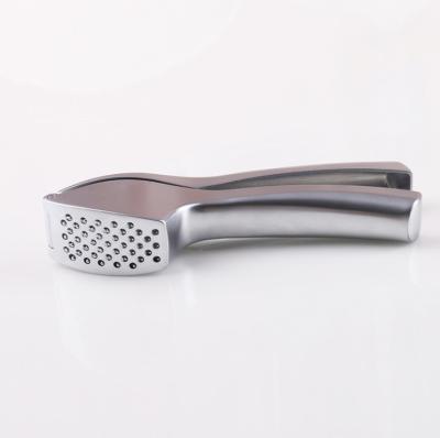 China Amazon Kitchen Tools Sustainable Hot Garlic Press Selling Best New Stainless Steel Products for sale