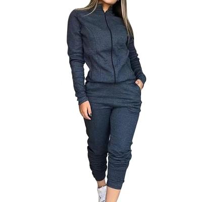 China New style autumn and winter raincoat long sheathed casual fashion sports suit women set two-piece solid color for sale