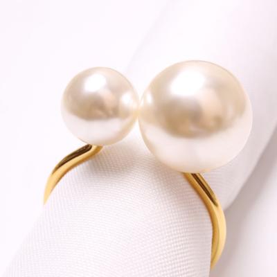 China Luxury Novelty Wedding Pearl Napkin Rings Holder Bling Metal Gold Napkin Rings Napkin Buckle For Dining Table Setting Decoration for sale