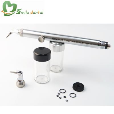 China Teeth Cleaning 4 Hole Aluminum Oxide Prophy Jet With Dental Microblaster Water Jet for sale