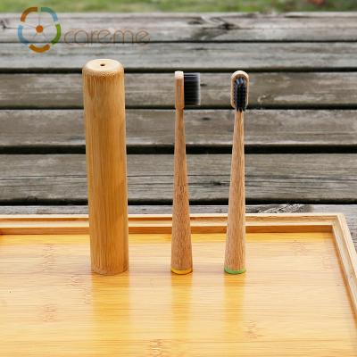 China Disposable Biodegradable Activated Carbon Bamboo Toothbrushes Round Handle for sale