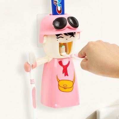 China New Design Cartoon Plastic Toothbrush Holder Stocked Wall Mounted Toothpaste Dispenser for sale