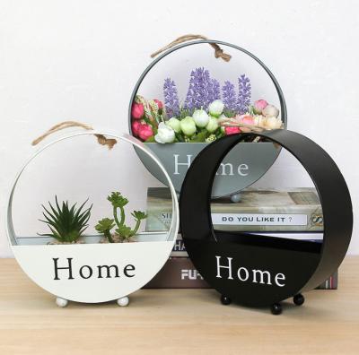 China Custom Stocked Round Shape Wall Hanging Iron Artificial Flower Pot Planter Basket for sale