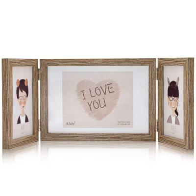 China Collage of three black 4x6 and 5x7 picture frame home decoration hinged for sale