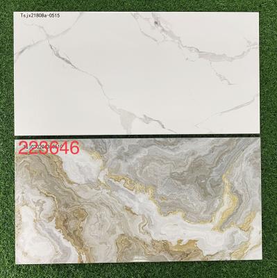 China 30x60/30x45cm Ceramic Tile Production House Glazed Metal Front Wall Tiles Design Kitchen Wall Tiles for sale