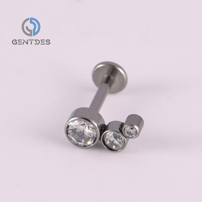 China ASTM FASHION F136 Titanium Steel Lip Piercing Rings Internally Threaded CZ Bezel Group Labret Lip Nose Ring Stud Earrings For Women for sale