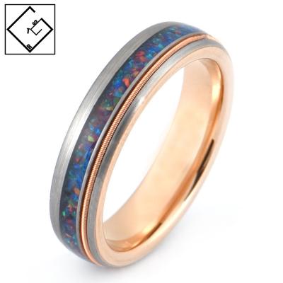 China CLASSIC Domed Crushed Mixed Opal Tungsten Couple Rings And Guitar String Inlay for sale