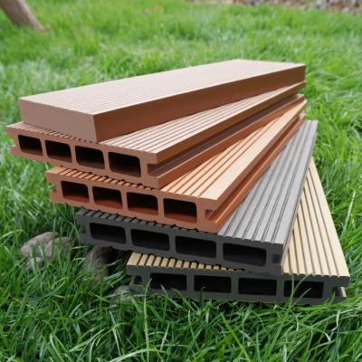 China DIY Floor Patio Garden Pool Balcony Piso Walkway Traditional Wood Plastic Composite Roof Tiles Interlocking WPC Board Deck Tiles for sale