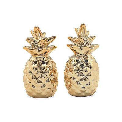 China Custom Cacuts Europe Style New Factory Ceramic Gold Salt and Pepper Shaker Set for sale