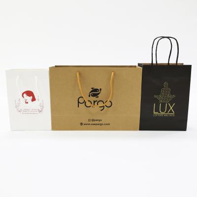 China Custom Recyclable Logo With Handles Luxury Shopping Packaging Paper Bags For Clothes for sale