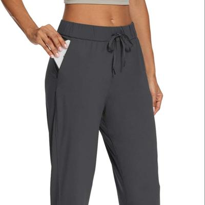 China Breathable Straight Leg Yoga Sweatpants Women High Waist Workout Yoga Fitness Tapered Joggers Sweatpants With Pockets Lounge Pants for sale