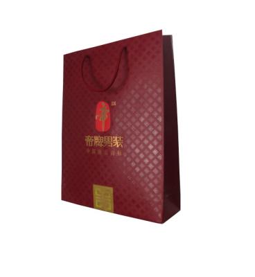 China custom eco-friendly full color paper bags printing with embossed logo for retail for sale