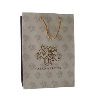 China Custom Printed Recycled Paper Packaging Bag with Gold Foil Logo Manufacturer for sale