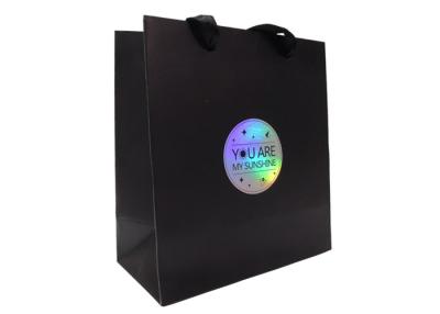 China Custom Printed Black Paper Clothing Shopping Bags with Hologram Logo Supplier for sale