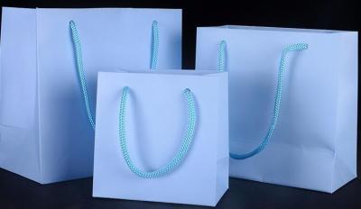 China Popular Craft Paper Bags Light Blue Paper Gift Bags For Jewelry Package for sale