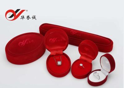 China Simple Design Velvet Jewelry Box Oval Red Flocking Ring Gift Box For Jewelry Packaging for sale