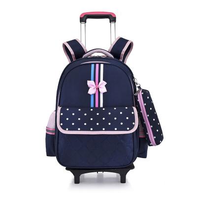 China Custom Anti-theft Dot Print Oxford Backpack Children Navy Blue Logo Pupil Backpack Bag School Kids Trolley Bag With Luminous Wheels for sale