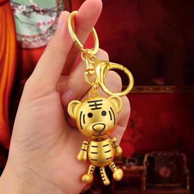 China Promotional Gift Year Of Tiger Money Lucky Bag Keychain Lucky Tiger Key Pendant Epoxy Paint Red Key Chain Gift for sale