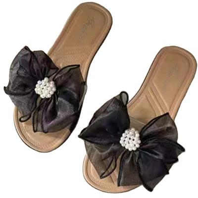 China 2022 fashion trend high explosive value female flat slippers large bow female wear-resistant mute sandals air freshener for sale