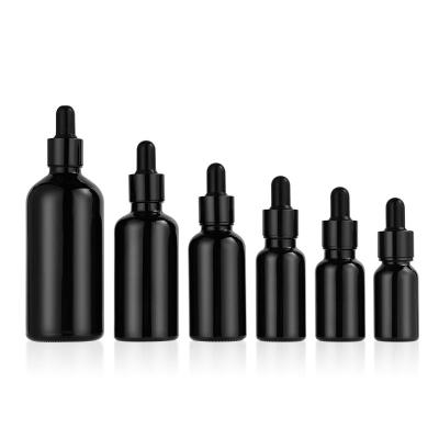 China Personal Care Wholesale 5ml 10ml 30ml 100ml Black Dropper Bottle Essential Oil Matt Black Bottles for sale