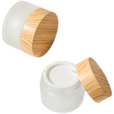 China 2021 Cosmetic Packaging 20ml Wooden Cream Container 50g Cream Jar Glass Face Cream Container for sale