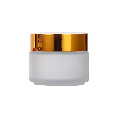 China Cosmetic high quality glass cream jar 50ml frosted empty face cream jars with 1oz lid for sale