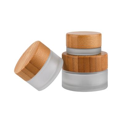 China Cosmetic high quality 30gm container for face cream jar 50mls cream glass frosted wooden cream jar 2021 for sale