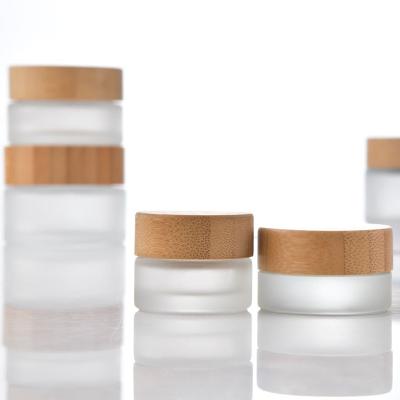 China Wholesale cosmetic frosted cream jar lid glass bamboo glass cream jar for female for sale