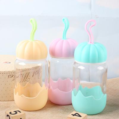 China Creative portable water pumpkin cups water bottle Infuser botol minum anak silicone water bottle for sale