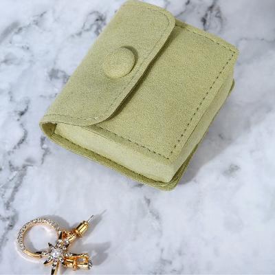 China Wrap Jewelry Pouch Emboss Fantastic Logo Drawstring Bag Style Jewelry Microfiber Gift Bag for sale