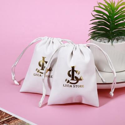 China Small Recyclable Logo PU Drawstring Pouch Custom Leather Jewelry Bag for sale