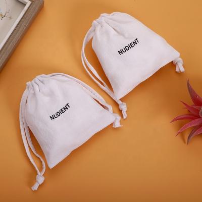 China Recyclable Organic Cotton Drawstring Pouch Custom Logo Muslin Drawstring Gift Cotton Bag for sale