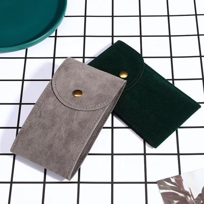 China Portable Recycable Travel Gift Wrapping Flap With Button Suede For Accessories Velvet Watch Bag Pouch for sale