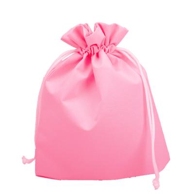 China Custom Recyclable 60G Polypropylene Non Woven Gift Bag With Ribbon Drawstring Closure Packaging Gift Bag Non Woven Bag for sale