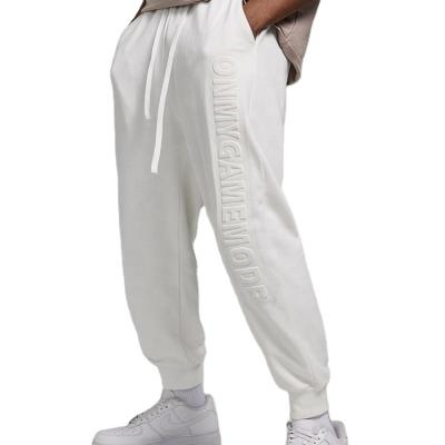 China custom unisex Anti-Wrinkle Track Jogger Pants Casual Embossed Sweatpants Men Sweatpants Wholesale Thick Oversized Hip Hops for sale