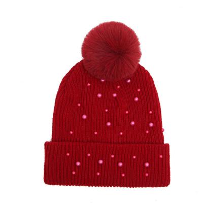 China Common Good Quality Winter Bobble Hat Women's Beanie Ladies Knitted Real Hat Warm Bottom Hat for sale