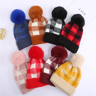 China JOINT Attractive Style Warm Knit Mens Womens Winter Hat Pom Pom Plaid Plush Ball Beanies Hat for sale