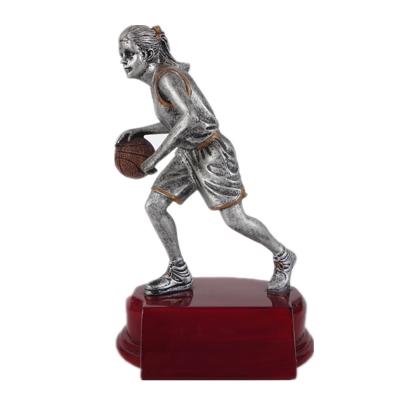 China Europe Basketball Awards Female Trophy Resin Player Figurines for sale