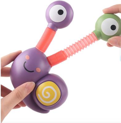 China Funny Toy Pop Tubes Sensory Stretch Snail Educational Toddler Toys with LED Light Relaxation Wiggles Gift for Special Kids Needs Developmental Toy for sale