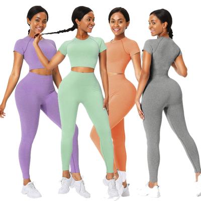 China 2021 New Color Two Piece Set Breathable Short Sleeve Thigh Crop Tops And Yoga Gaiters Yoga Sets Fitness Women for sale