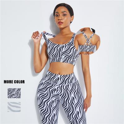 China Logo Service Two Piece Woemn Seamless Yoga Set Clothing Set Snake Printing High Waisted Breathable Women Leggings for sale