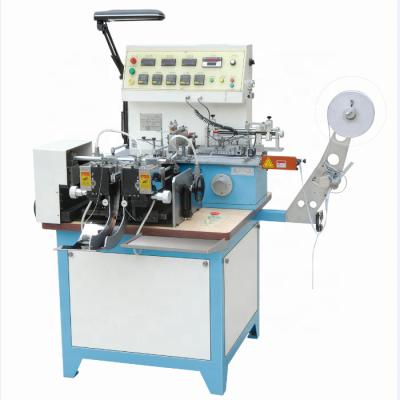 China Automatic Multifunction Printing Label Cutter and Fold Machine for Woven Label, Satin Ribbon, Polyester Fabric Nylon Tape JZ-2817 for sale