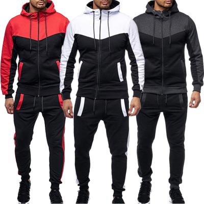 China Custom Anti-Static Winter Tracksuits Men Fashion Print Patchwork Jogging Plain Slim Fit Cotton Tracksuits for sale