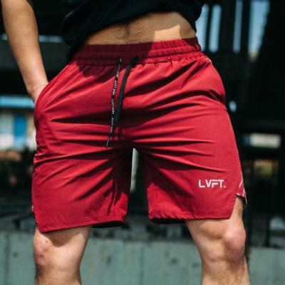 China 2021 Fashion Viable Fitness Lift Shorts Running Solid Color Training Pants Gym Dry Shorts For Men for sale