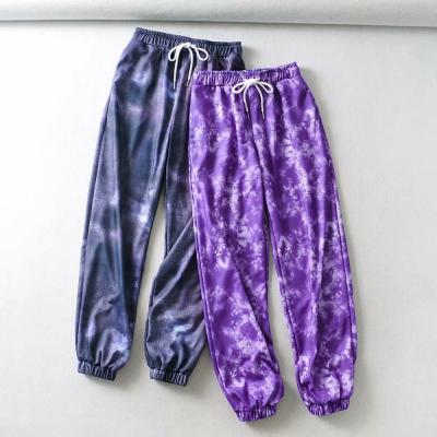 China Anti-wrinkle Europe and the United States 2021 new autumn and winter women's casual pants waist elastic cord tie-dye sweatpants hole for sale