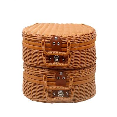 China Retro Plastic Woven Rattan Woven Basket Food Picnic Basket Plastic Woven Oval Suitcase Luggage Storage Plastic Rattan Woven Basket for sale