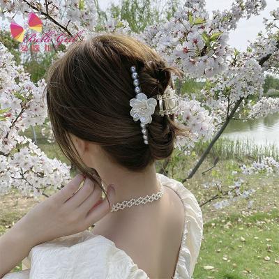 China BELLEWORLD Fashion Trendy Women Pearl Flower Hair Claw Clips White Camellia Hair Claws for sale