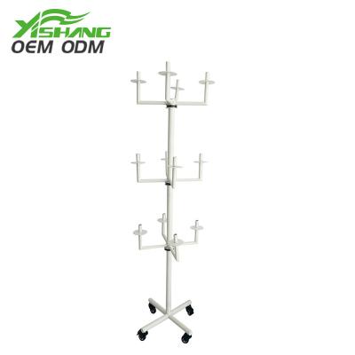 China 3 Layer Rust Protection Custom Metal Floor Rack Headstand Display Stand for sale