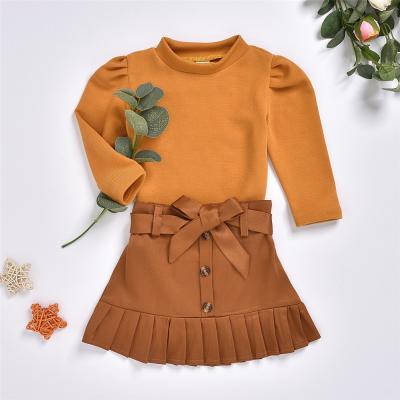 China Infant Casual Kids Autumn Bubble Sleeve Set Orange T-Shirt + Pleated Skirt Two Piece Set for sale